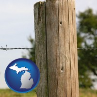 michigan map icon and a fence, constructed of wooden posts and barbed wire