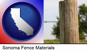 a fence, constructed of wooden posts and barbed wire in Sonoma, CA